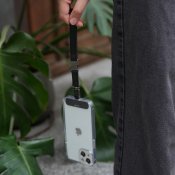 Moshi 2-in-1 ranne/vartalohihna - Keskiyön musta